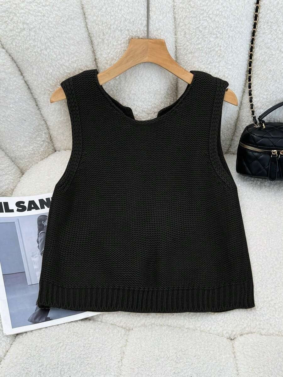 Black Sleeveless Crop Top with White Bows