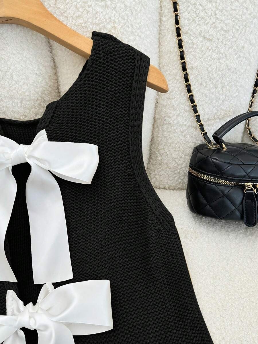 Black Sleeveless Crop Top with White Bows