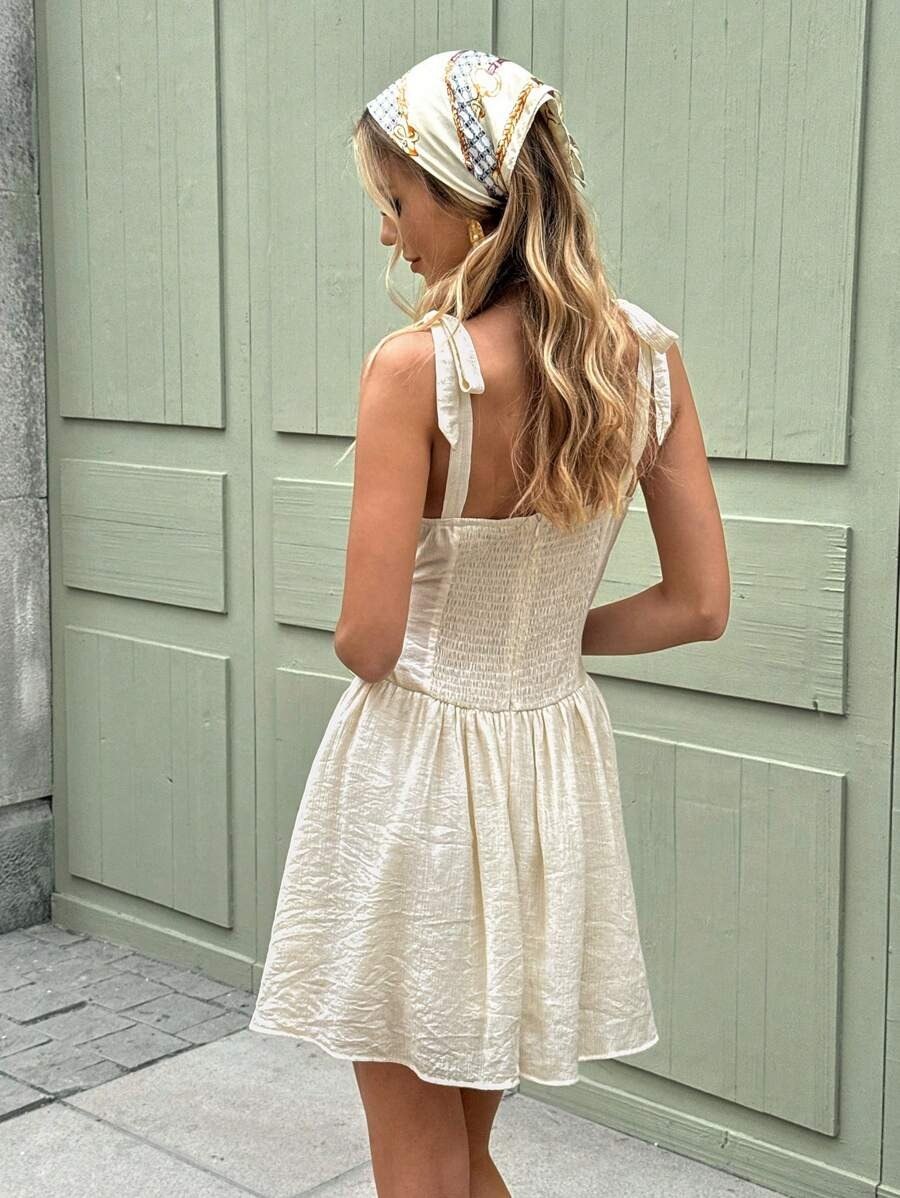 Off-White Solid Sleeveless Tie-Up Shoulder Casual Mini Dress